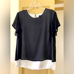 Ann Taylor Navy Blouse with White lining that is longer. Size Medium